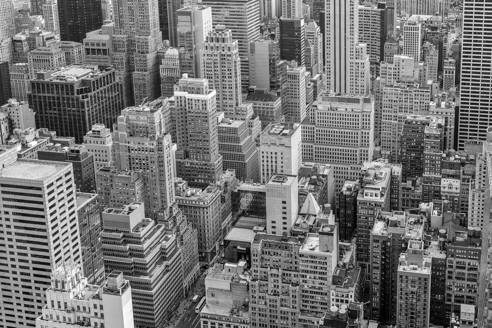 grayscale photo of high rise buildings