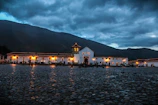 Historic colonial architecture of a charming Sugamuxi town square at sunset.