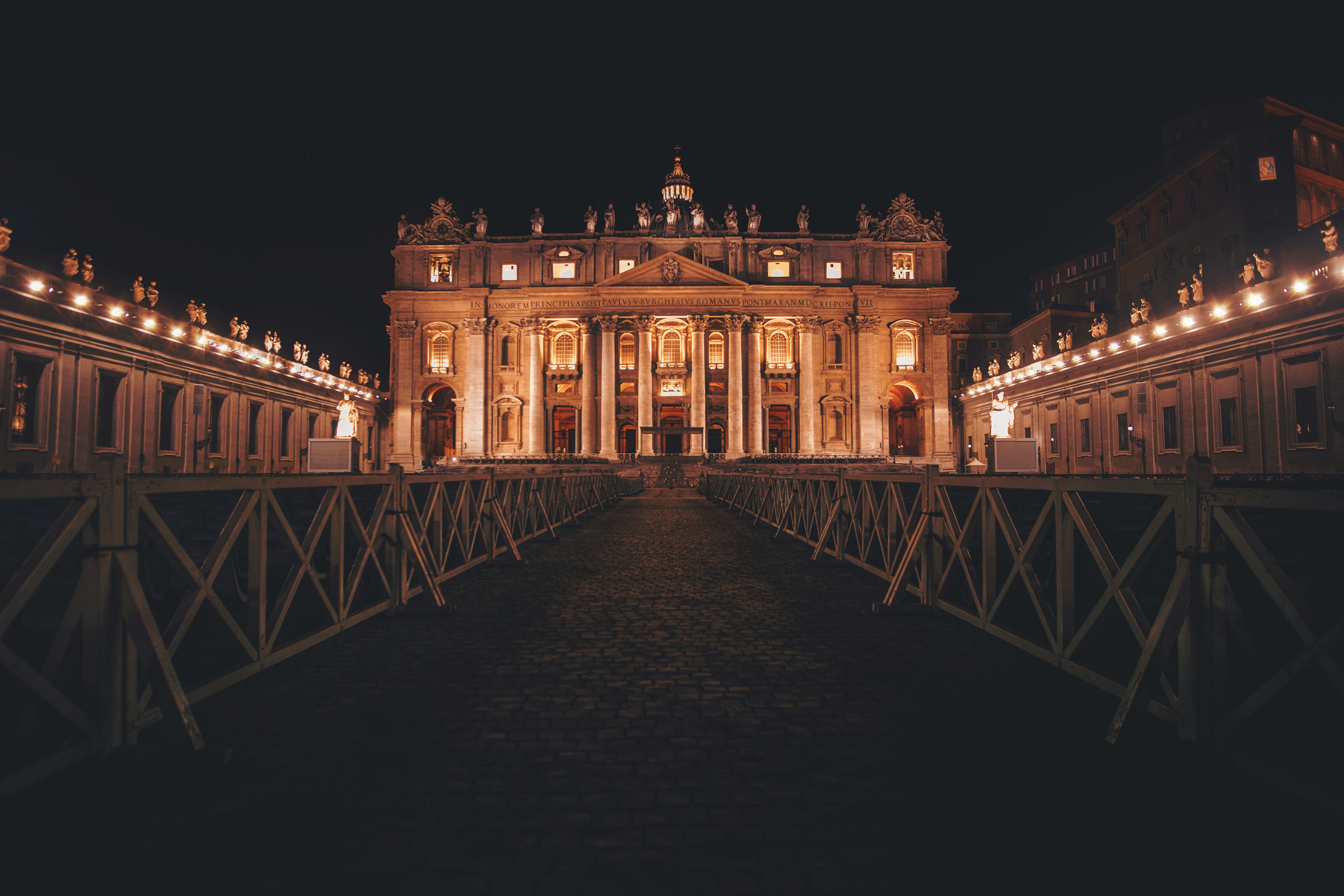 pathway leading to Saint Peter's Basilica at night time