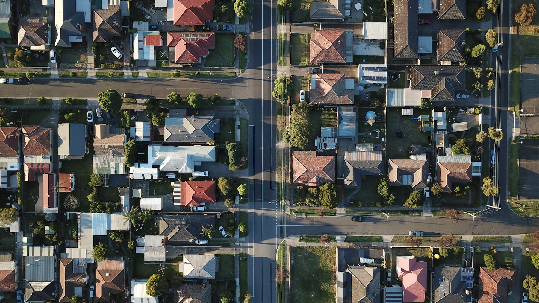Aerial view of an Australian suburb with terracotta rooftops