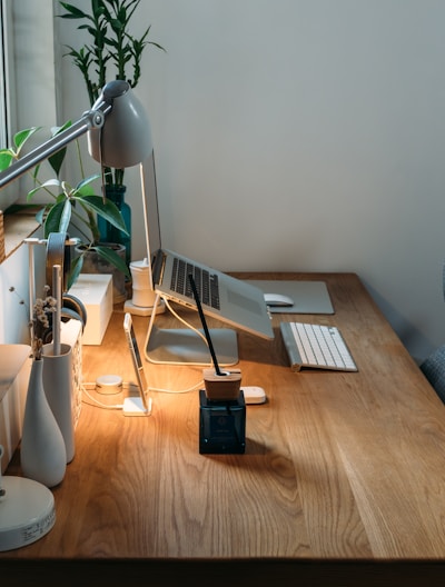 grey desk lamp on top of office desk