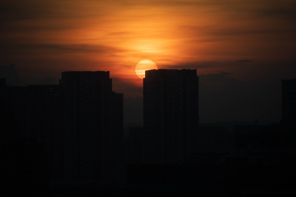 city buildings and sunset