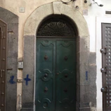 Durava safe door guarding the entrance of a bustling commercial building.