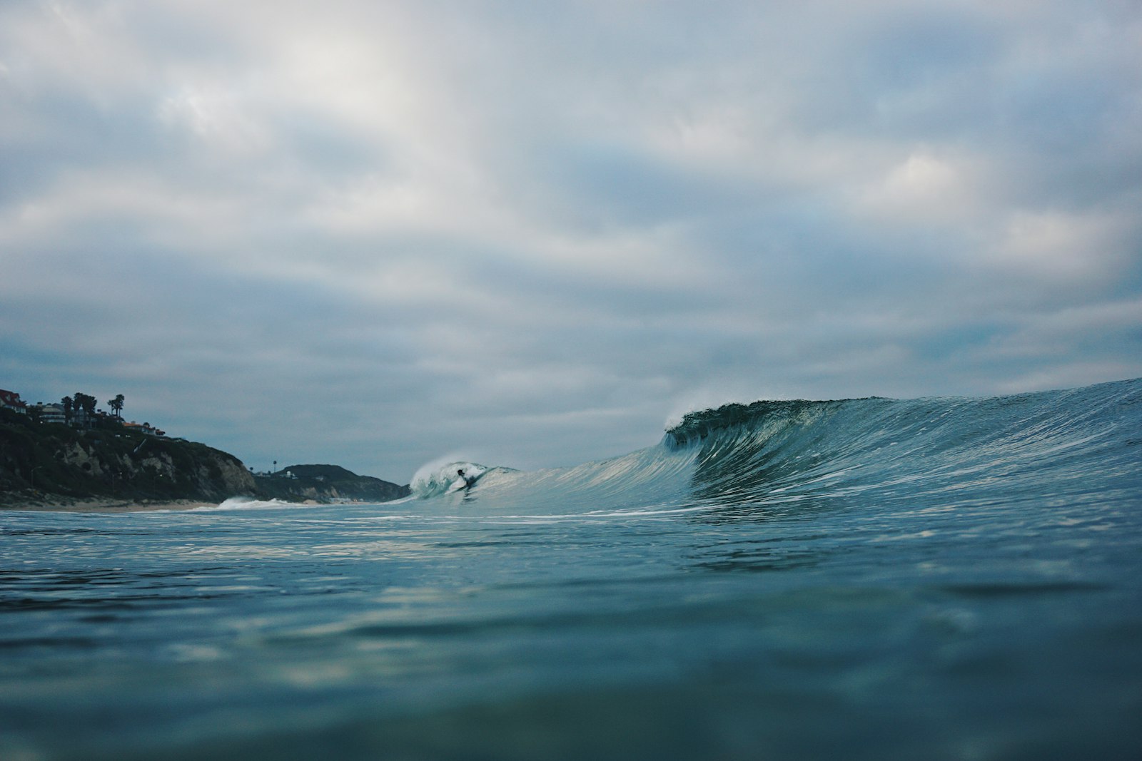 Sony E 18-50mm F4-5.6 sample photo. Person surfing with wave photography