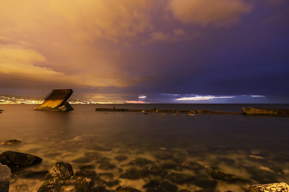 photography of calm body of water