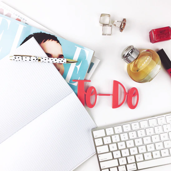 clear glass perfume bottle with text overlay