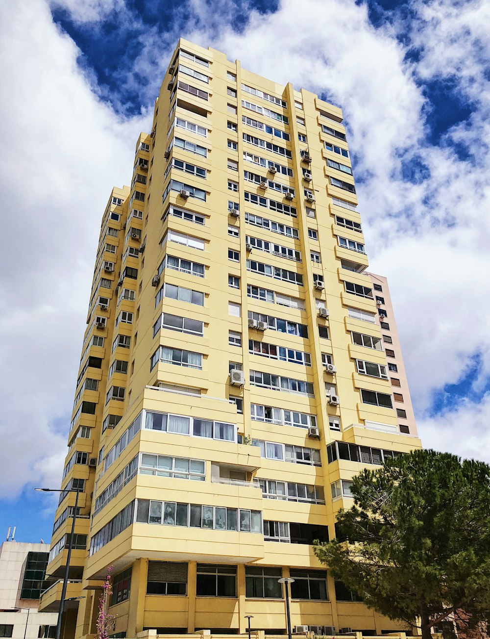 yellow concrete building during daytime