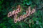 and breathe neon sign on tre
