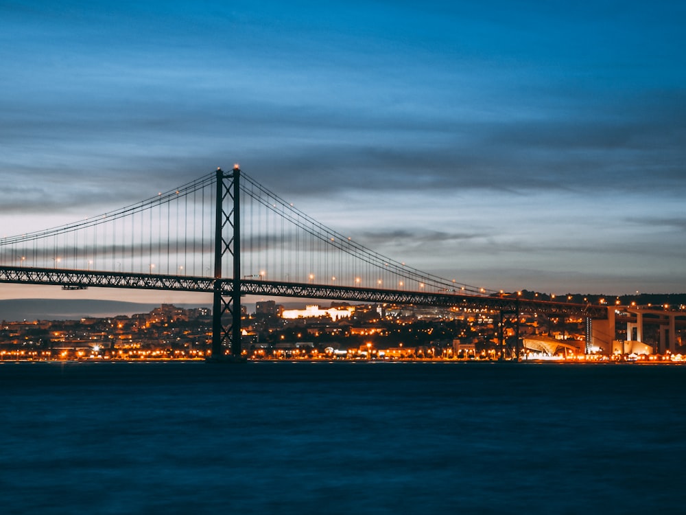 concrete bridge at night time