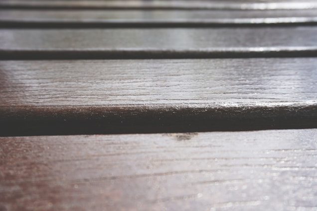 Close-up of a beautifully finished natural wood floor in a sleek, modern living space.