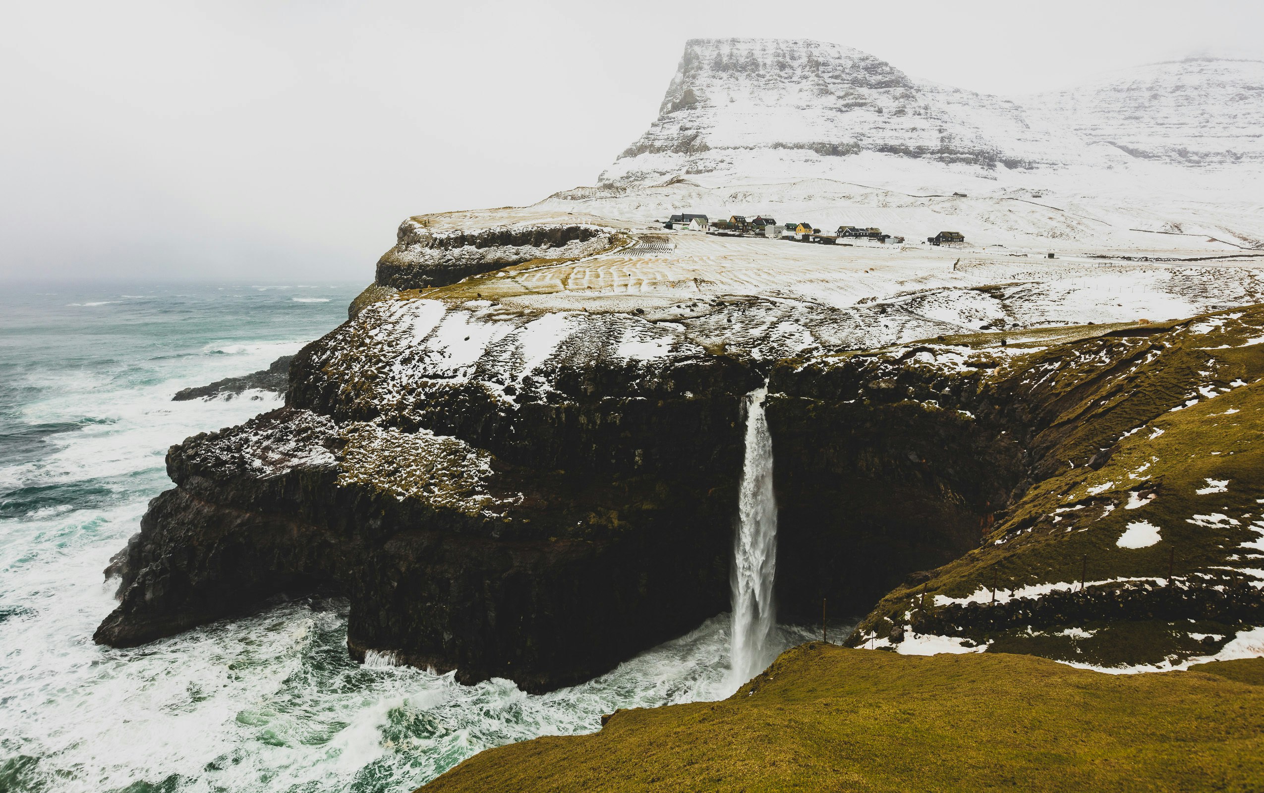 time lapse photography of waterfall leading to ocean