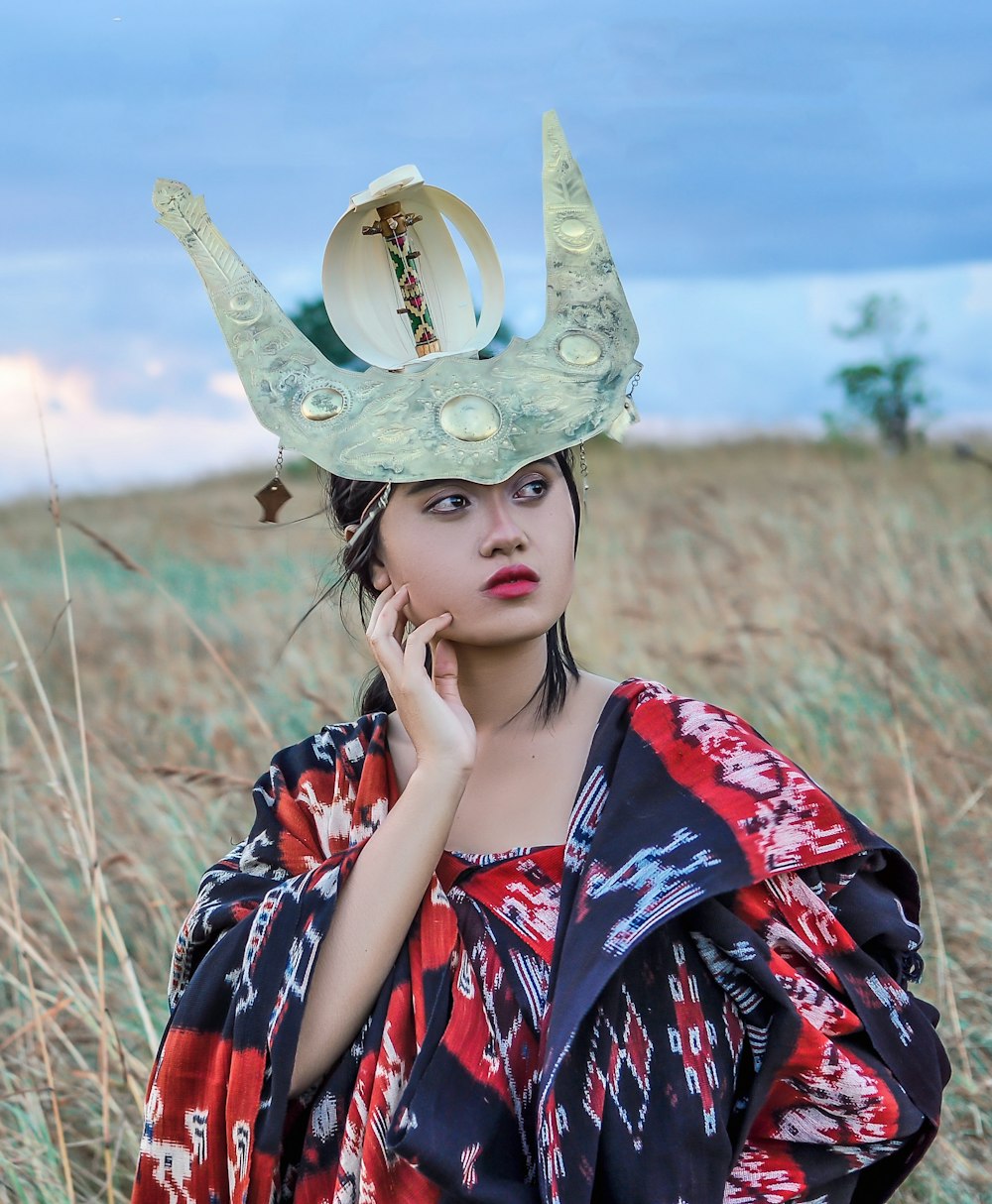 woman taking photo shoot in fields during daytime