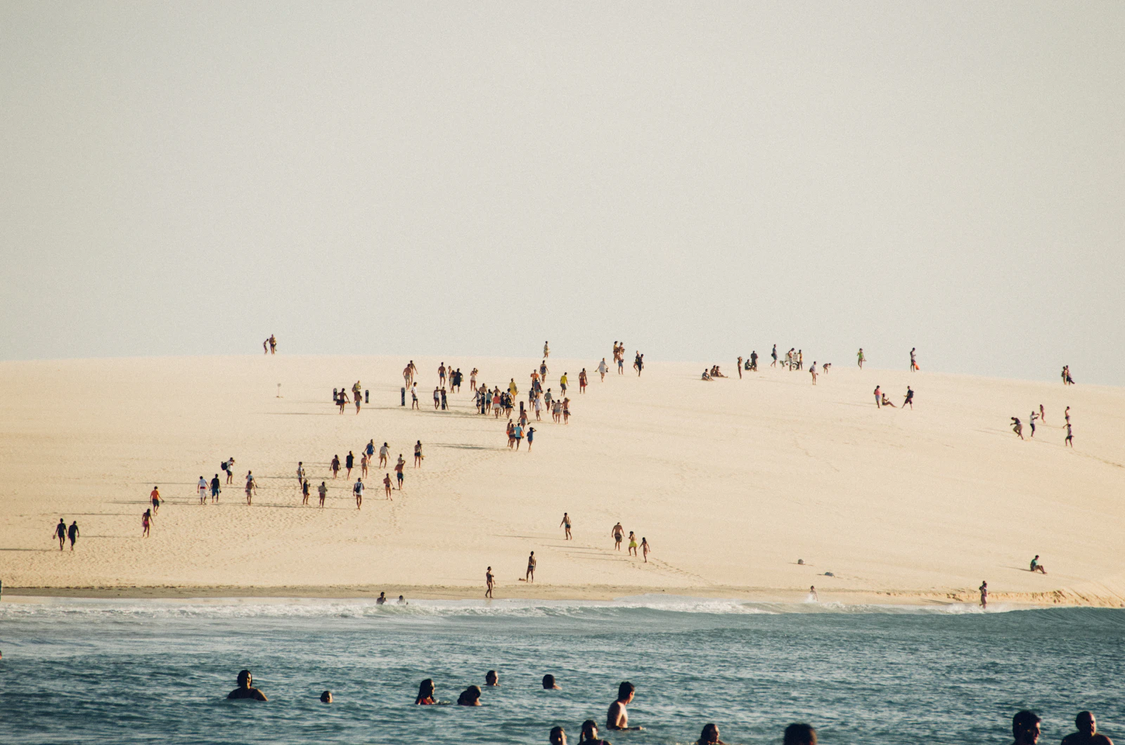 People on the sunset dune above the beach — Jericoacoara, Brazil