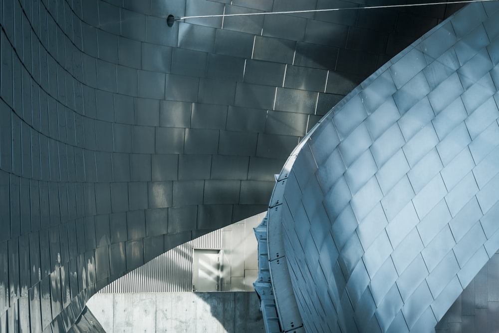 a large metal structure with a sky background