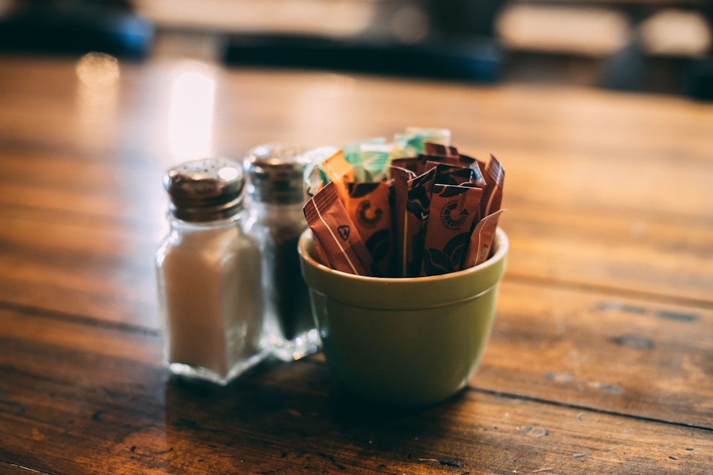 clear condiment shakers and white ceramic container