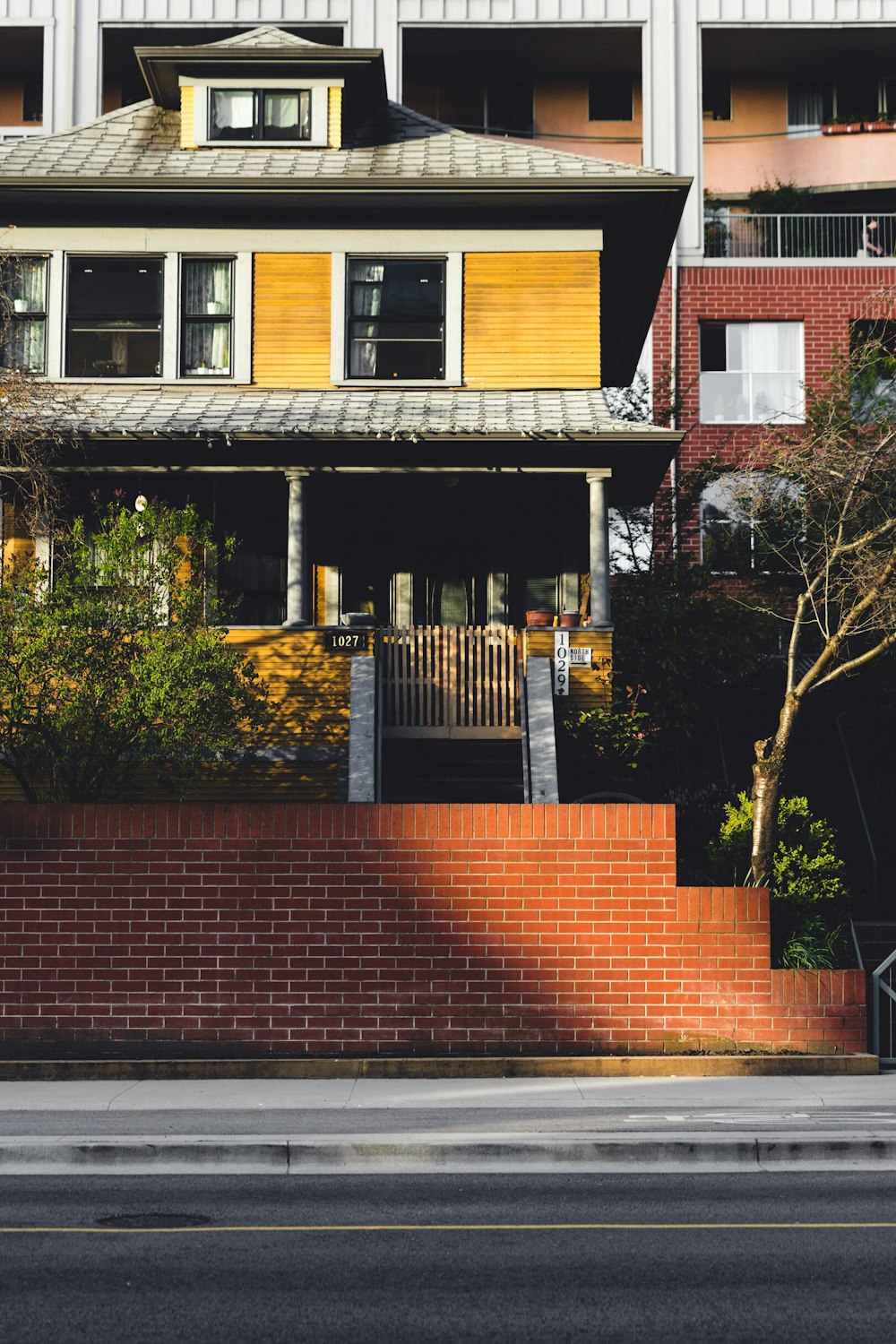 brown, white, and black house at daytime