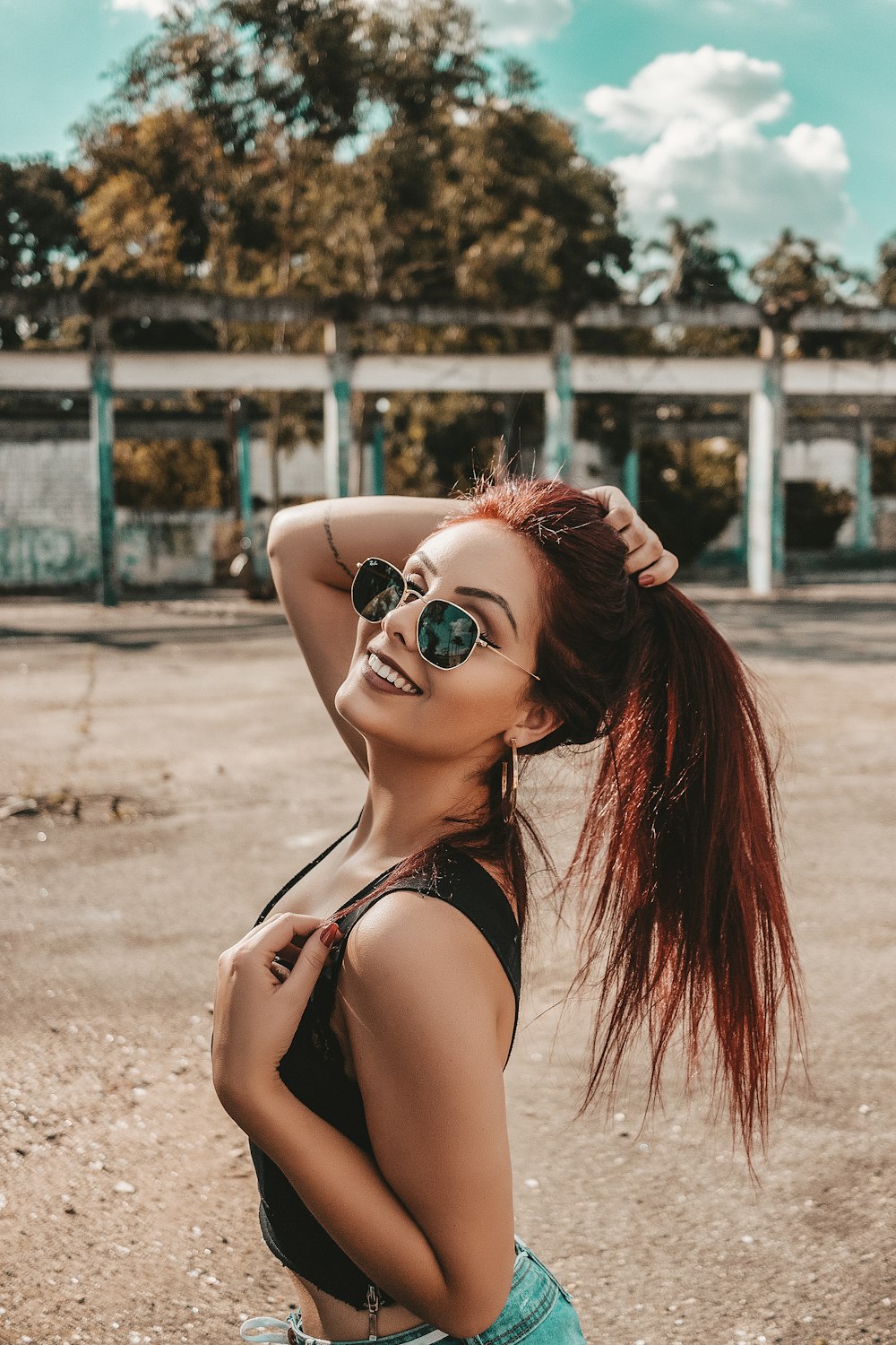 woman standing outside the building during daytime