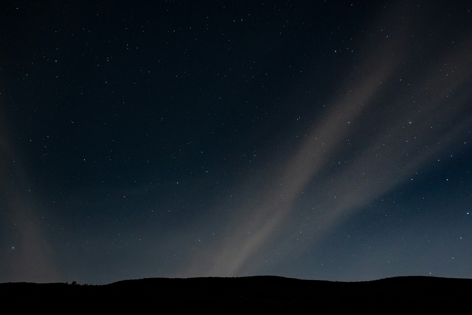 Sony a7R II + ZEISS Loxia 35mm F2 sample photo. Silhouette of mountain under photography