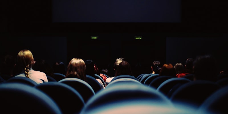 Waiting at a cinema before a movie starts
