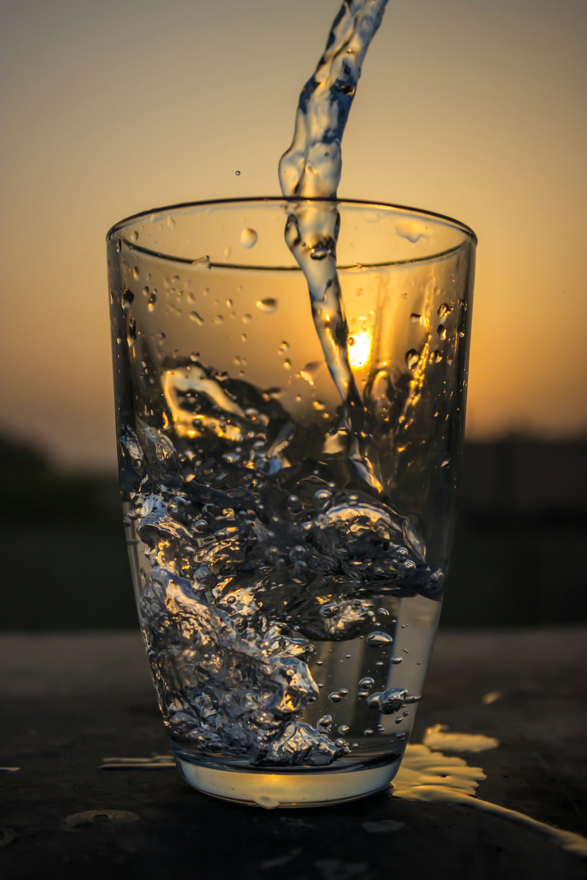 woman wearing yellow long-sleeved dress under white clouds and blue sky during daytime