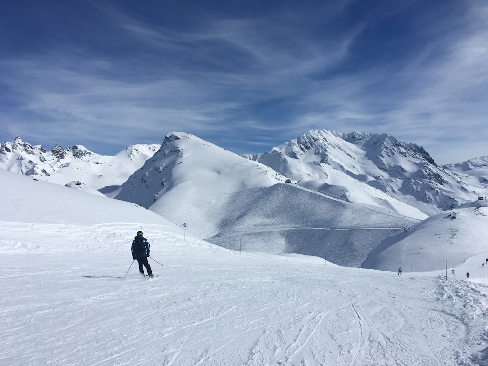 person skiing on snowy mountain