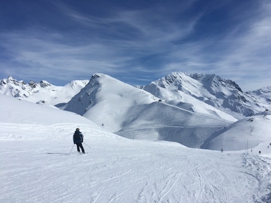 person skiing on snowy mountain in Les Menuires France