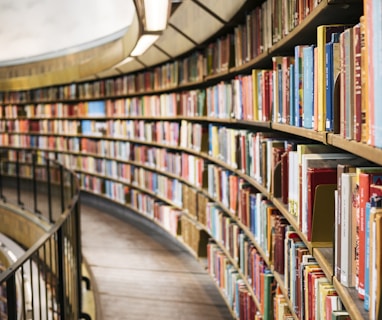 books on brown wooden shelf