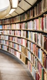 books on brown wooden shelf