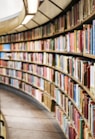 books on brown wooden shelf