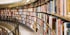 books on brown wooden shelf