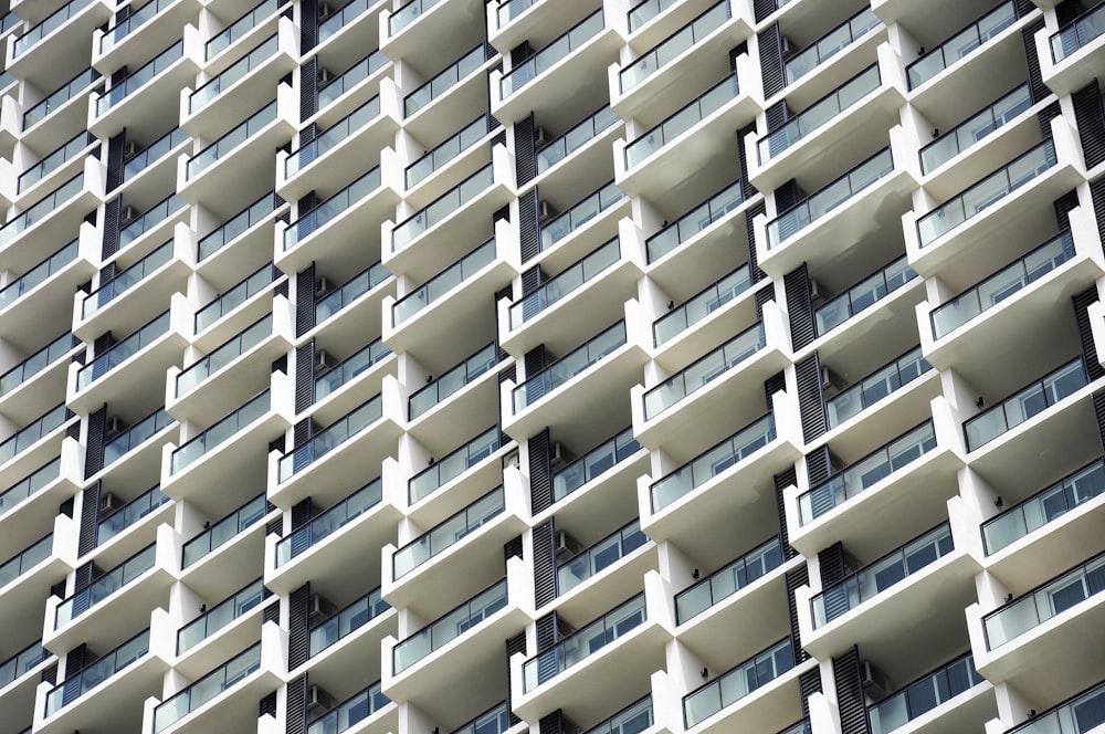 low-angle photo of white concrete building