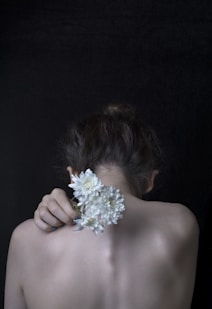 woman holding flower