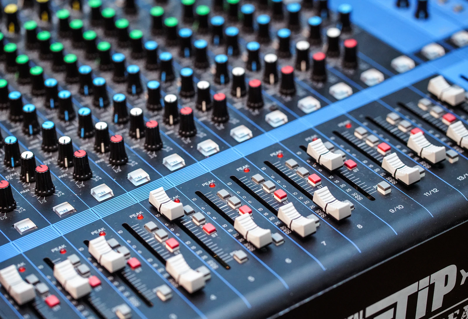 Closeup of an audio mixing console