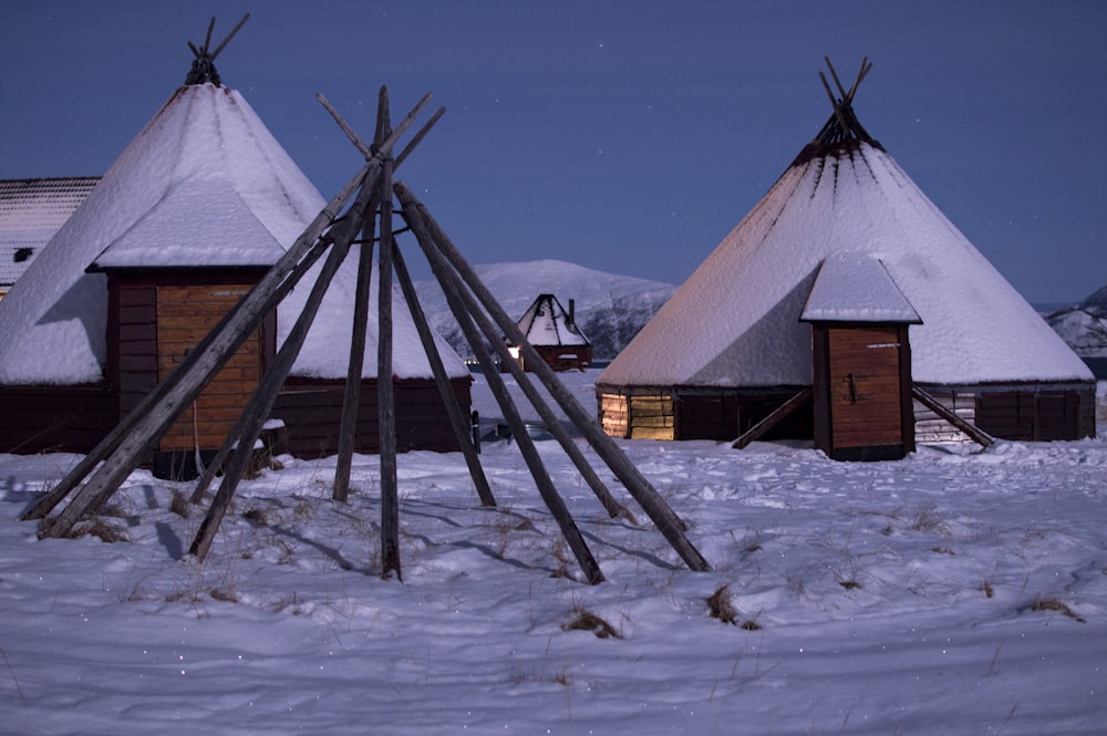 two white tents on winter