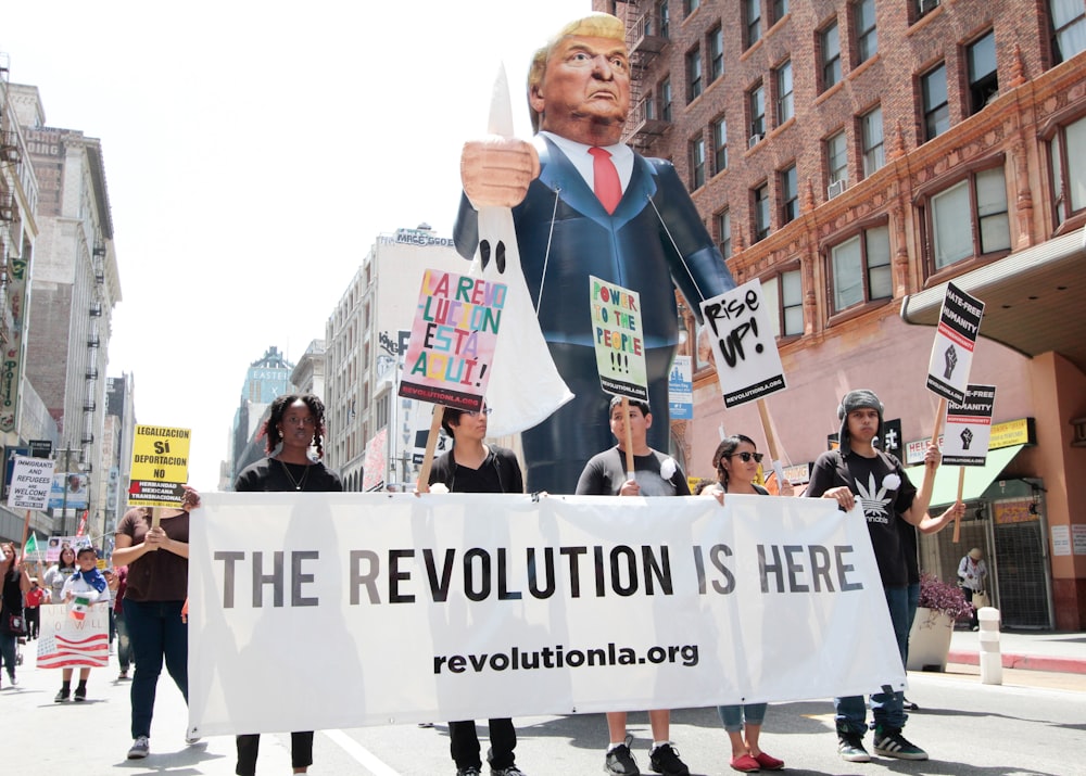 group of people doing protest rally