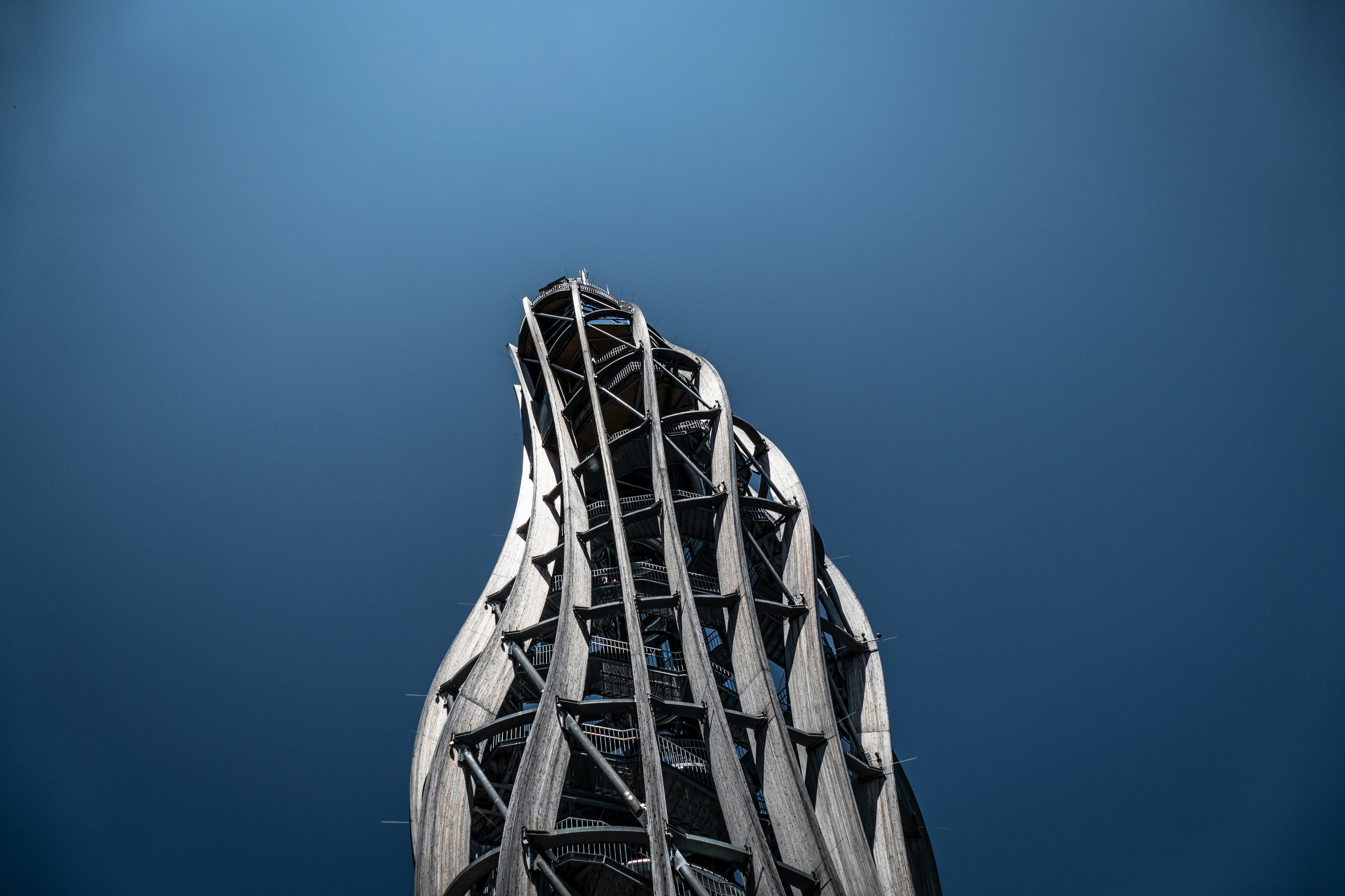 modern curved gray structure with clear skies