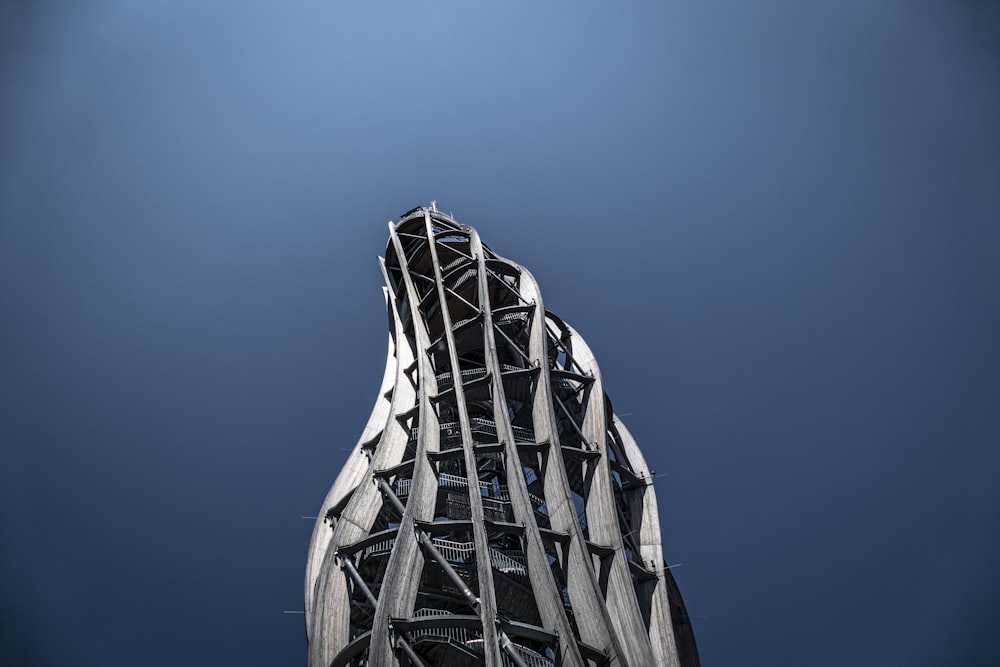 modern curved gray structure with clear skies