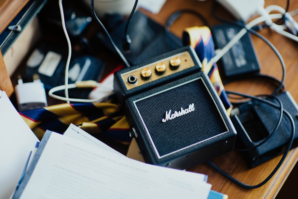 shallow focus photography of Marshall guitar amplifier