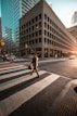man crossing pedestrian lane