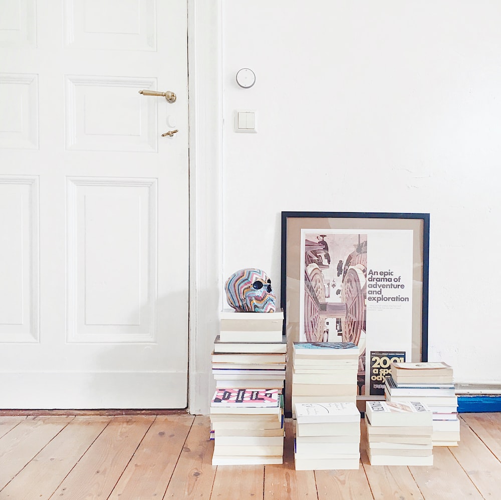 assorted books near door