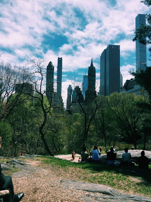 Scenic view of Oeiras town square during a sunny afternoon with locals enjoying the park