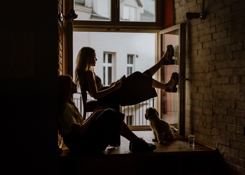 two women on the window