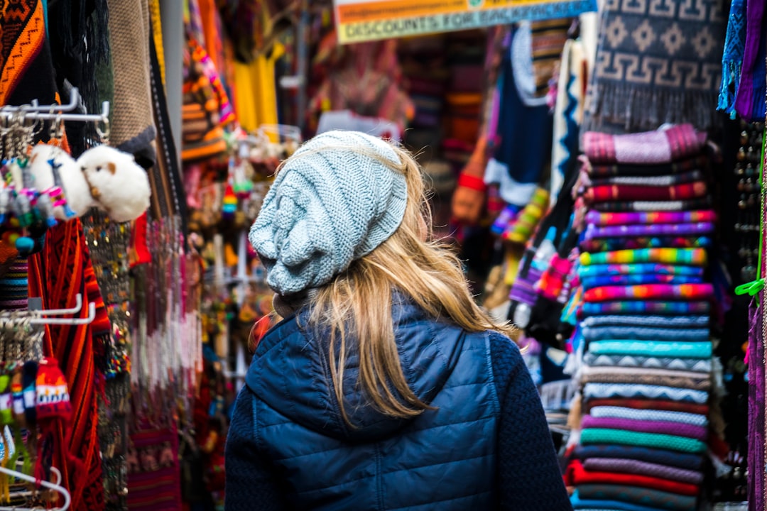 woman standing on clothes market