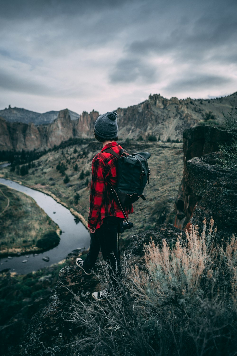 person standing on the cliff