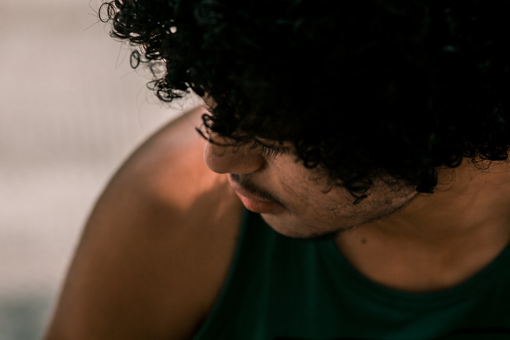 selective focus of man wearing black tank top