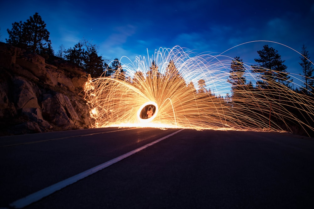 time lapse photography of fire dancing