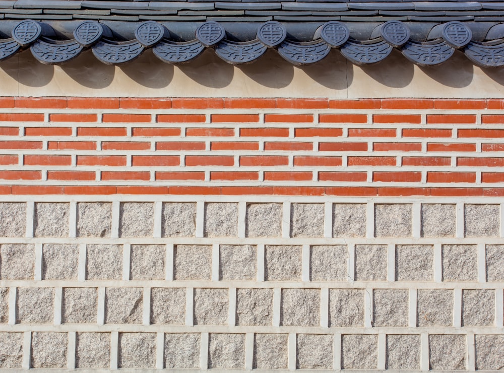 gray and brown wall bricks