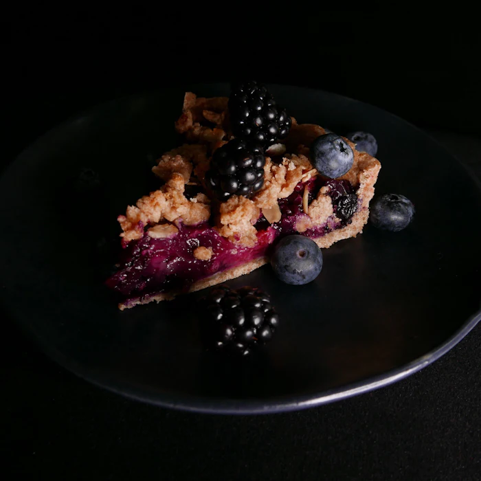 Blackberry crumble tart slice