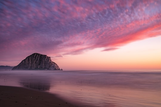 landscape photography of seashore near rock islet in Morro Rock United States