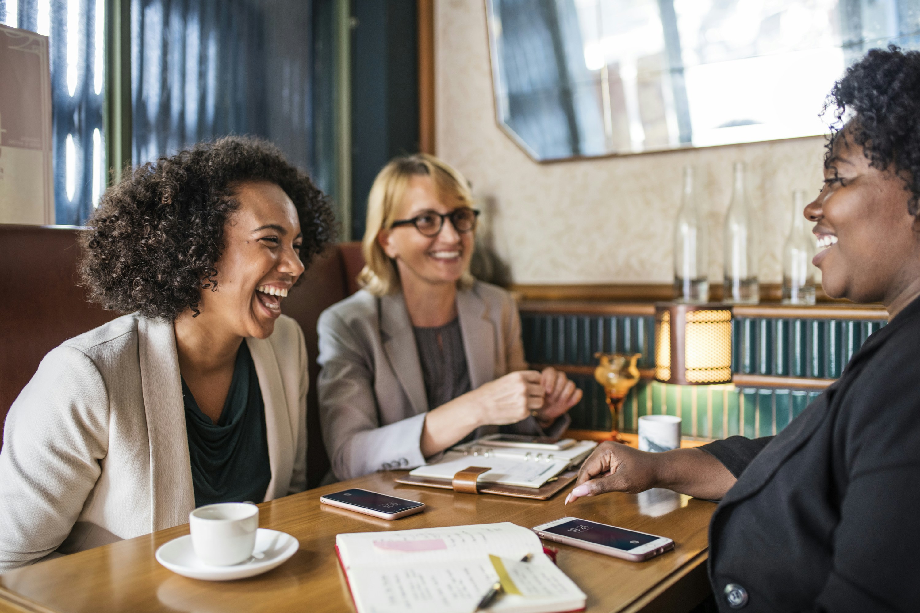 three women laughing